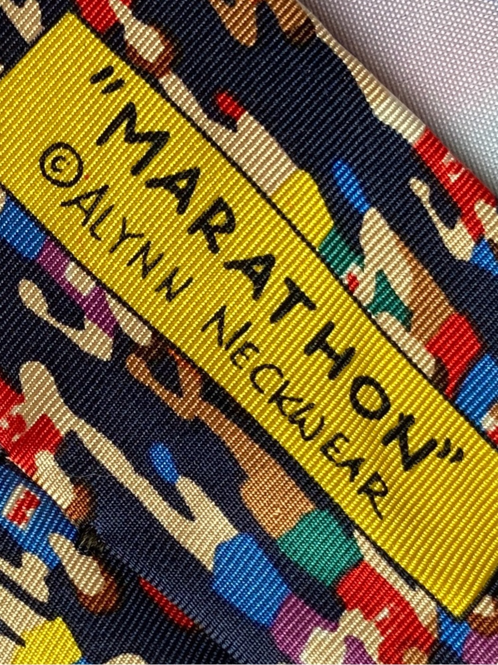 Alynn Neckwear 100% Silk Marathon Print Tie in Navy with Multicolor Figures - Picture 8 of 10